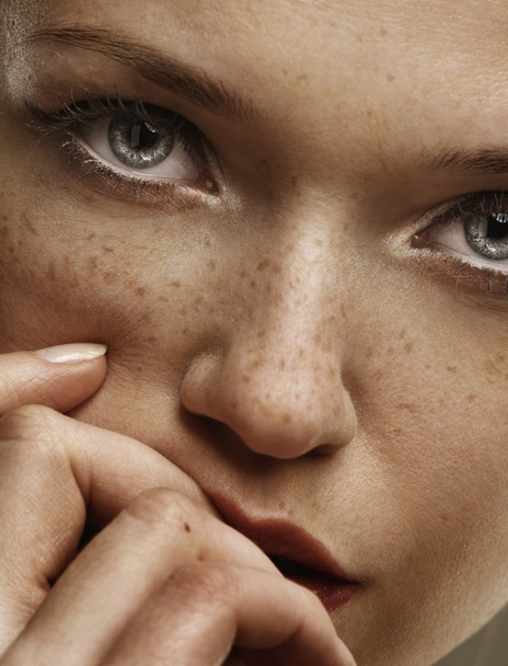 Brunette woman with freckles - Фото, зображення