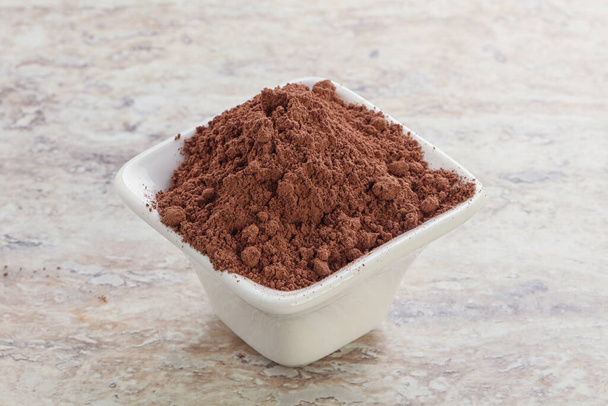 Natuurlijk biologisch aroma cacaopoeder voor culinair gebruik - Foto, afbeelding