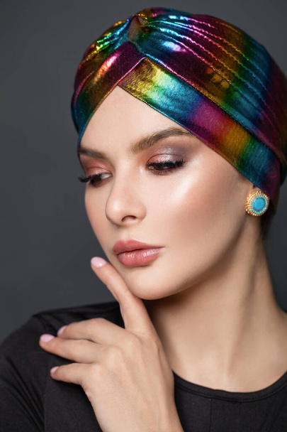 Close up female model face. Perfect woman in turban - Photo, image