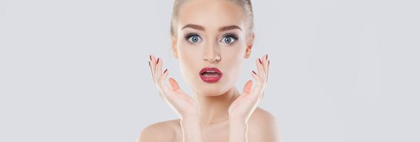 Pretty surprised woman with portrait on white banner background - Photo, Image