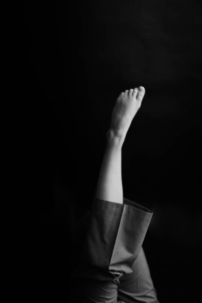 body details, gloomy leg image, defocus and blurring of the image - Fotografie, Obrázek