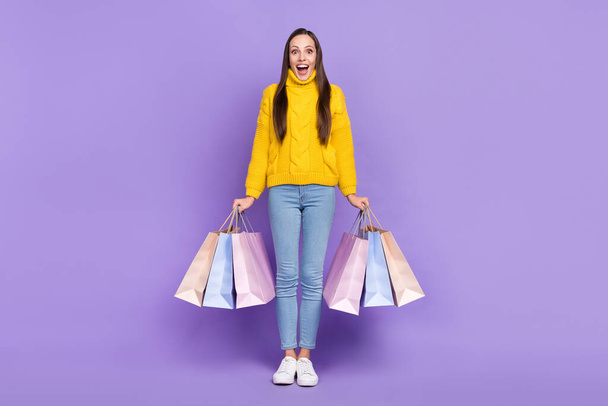 Full size photo of happy excited crazy woman shopaholic see huge bargains off-sales isolated on violet color background - Foto, Bild