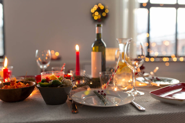 table serving for christmas dinner party at home - Фото, изображение