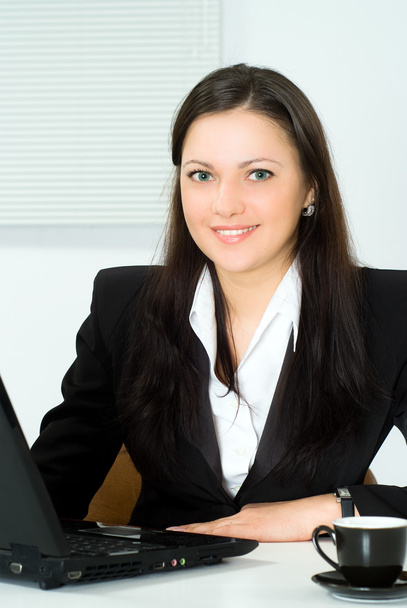 Beautiful girl working in the office - Foto, Imagem