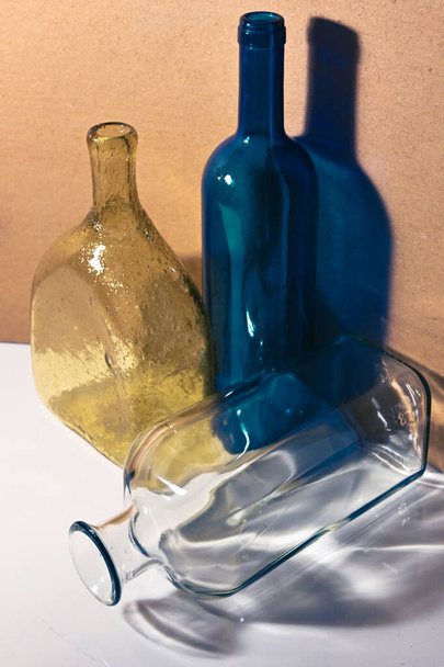 glass bottles still life on white background - Foto, Imagem