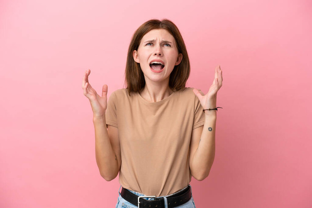 Young English woman isolated on pink background stressed overwhelmed - Zdjęcie, obraz