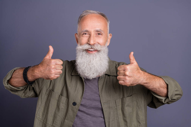 Photo of mature man show fingers thumb-up approval yes quality excellent great advertise isolated over grey color background - Photo, image