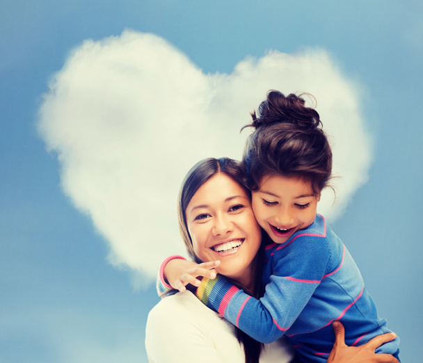 hugging mother and daughter - 写真・画像