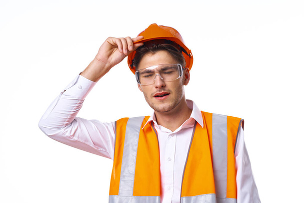 man in work uniform orange helmet safety professional work - Fotó, kép