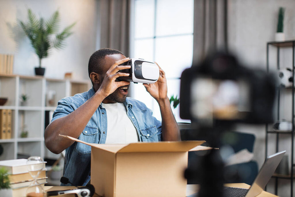 African man recording video while testing VR glasses - Fotoğraf, Görsel