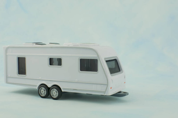 Motorhome  camper van trailer toy on ligth background - Photo, Image