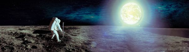 Astronauta a aterrar na Lua. Caminhada espacial na lua. Vista panorâmica da superfície lunar e do planeta Terra à luz. Elementos desta imagem fornecidos pela NASA
. - Foto, Imagem