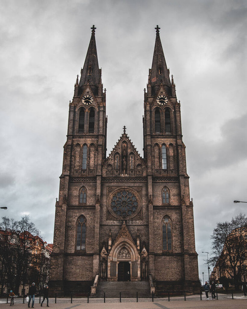 A scenic shot of the Church of Saint Ludmila in Prague, Czech Republic, on a moody da - Fotoğraf, Görsel