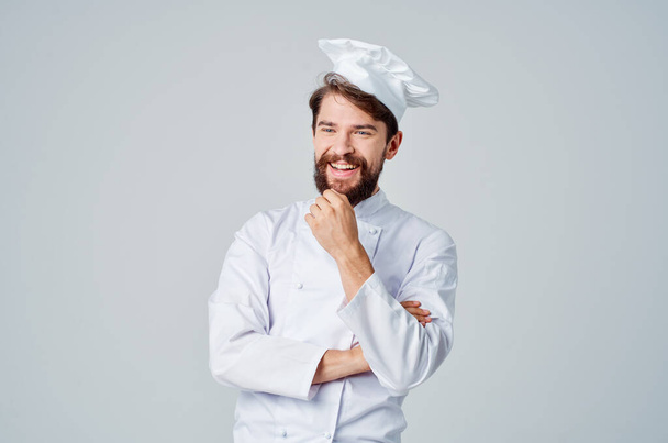 cocina masculina restaurante servicio fondo luz profesional - Foto, Imagen