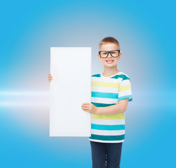 smiling boy in eyeglasses with white blank board - Foto, imagen