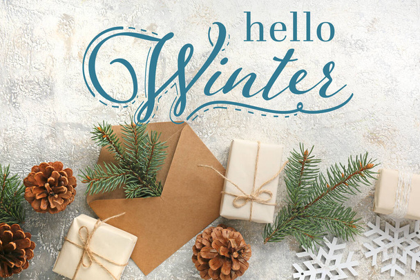 Envelope with Christmas gifts on grunge background. Hello winter - Photo, Image