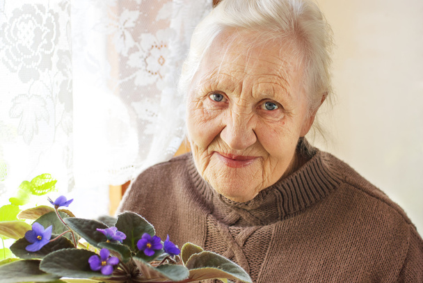 Elderly woman flower - Photo, Image