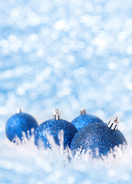 Blue Christmas Balls on sparkle background - Photo, image