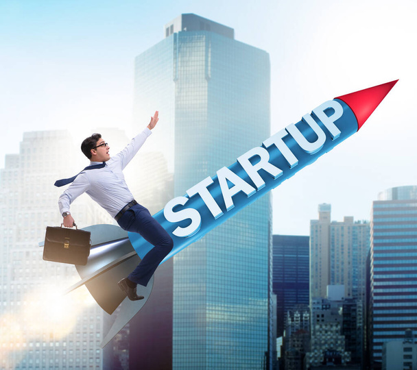 Businessman in start-up concept flying on rocket - Photo, Image