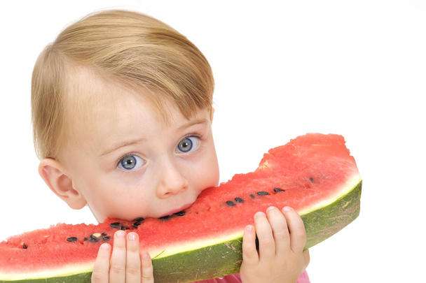 Girl eating watermelon - Фото, изображение