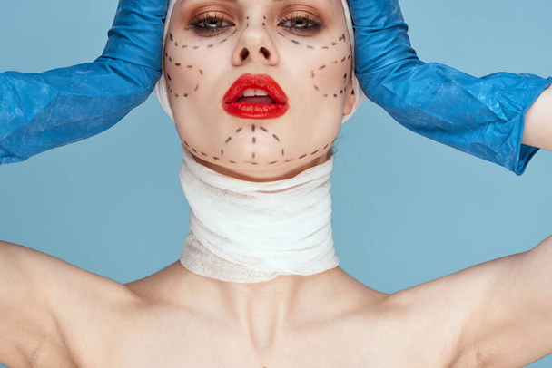 female patient Red lips plastic surgery operation bare shoulders blue background - Foto, immagini