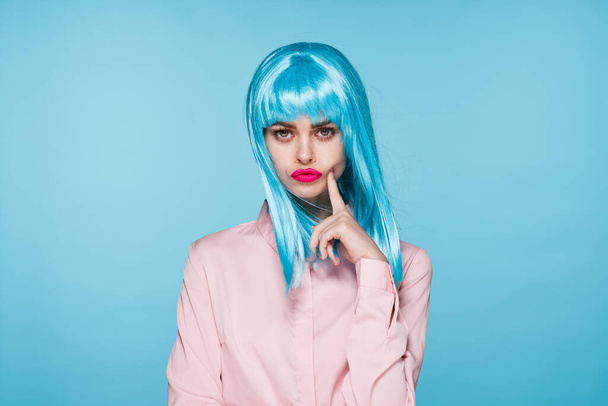 cheerful glamorous woman in pink shirt blue wig makeup model - Foto, immagini