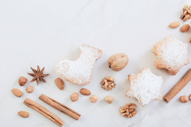 christmas cookies on white marble table - Foto, afbeelding