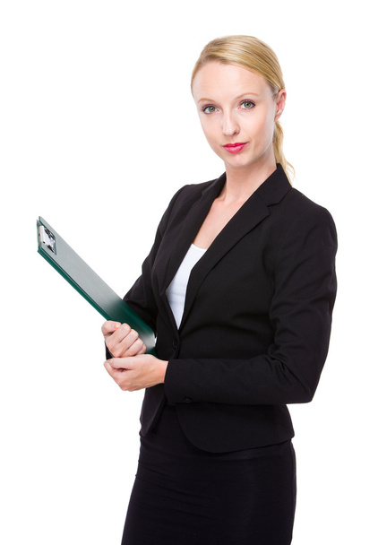 Businesswoman with clipboard - Foto, afbeelding