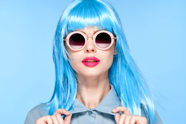 cheerful woman wearing sunglasses blue wig glamor model - Фото, зображення
