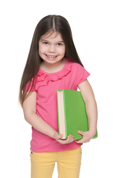 Pretty little girl with a book  - Valokuva, kuva