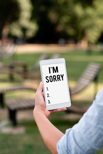 Ручной знак "Простите". Слово, написанное на просить прощения у кого-то, кого ты ненамеренно обидел Голос и Видео, призывающие возможности, соединяющие людей вместе - Фото, изображение