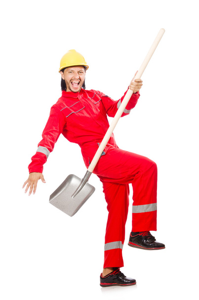 Człowiek w czerwonym kombinezonie z łopatą - Zdjęcie, obraz