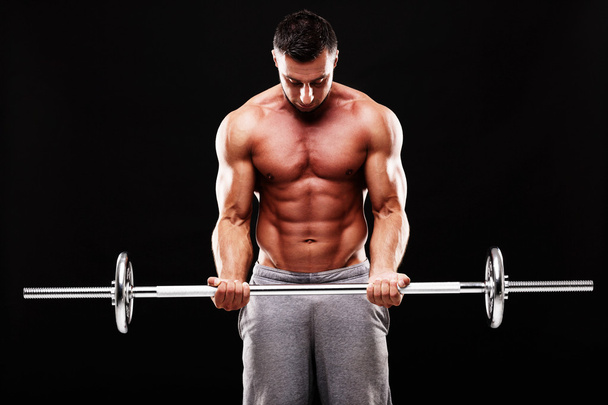 Handsome muscular sportsman isolated - Фото, зображення