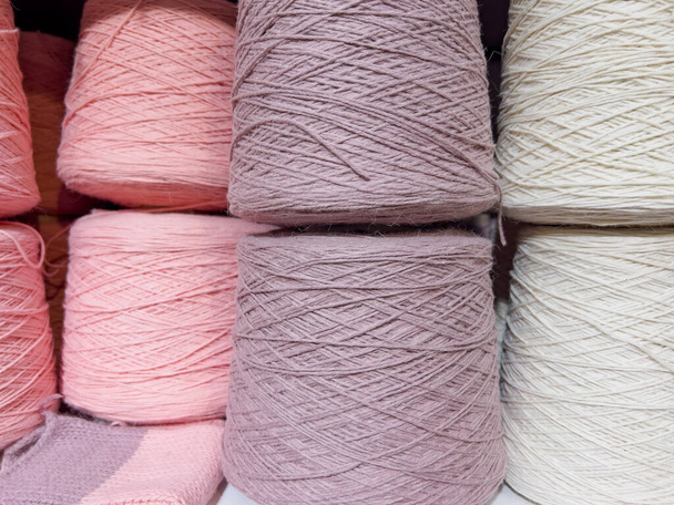 Set of pink yarn threads on bobbins - Φωτογραφία, εικόνα