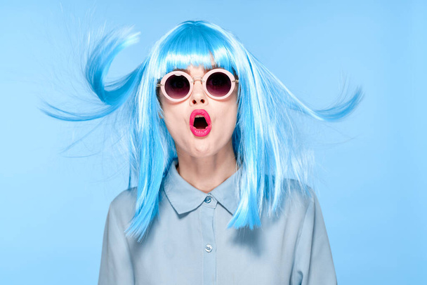 cheerful woman wearing sunglasses blue wig glamor model - Fotoğraf, Görsel