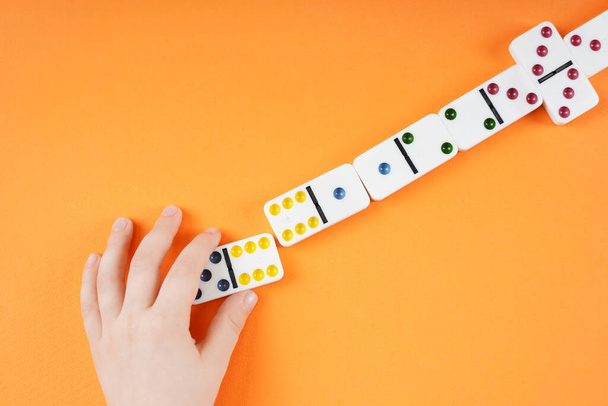 Children playing domino game. Table educational games. - Foto, Bild