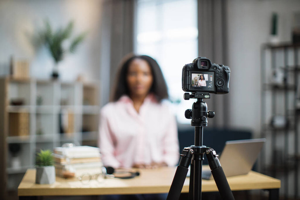 African american woman filming video blog on camera - Foto, Imagem