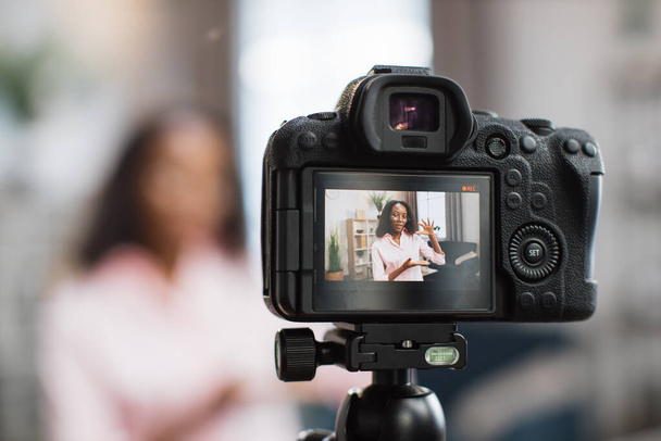 African american woman recording video blog at home - Фото, зображення