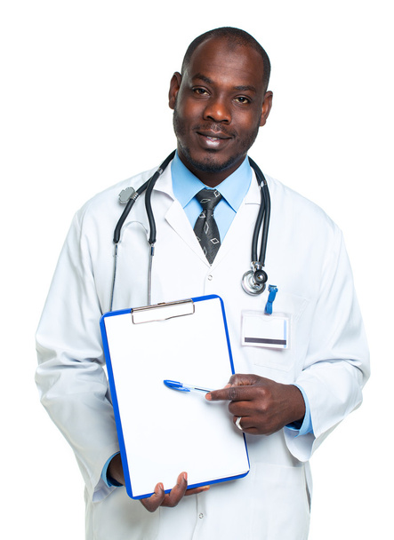 Young male smiling doctor showing clipboard with copy space for  - Foto, afbeelding