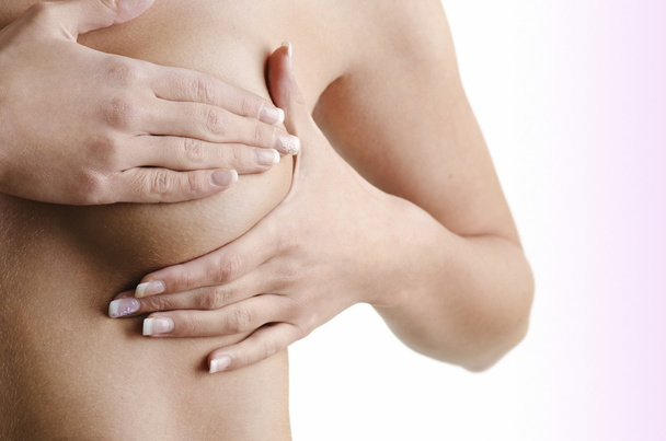 女性と手の胸テスト - 写真・画像