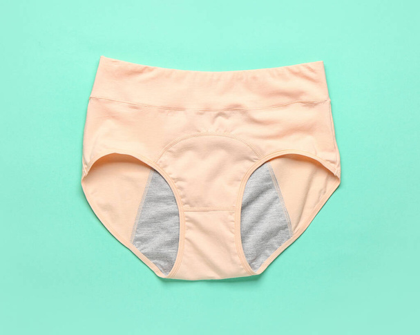 Period panties on color background - Photo, Image