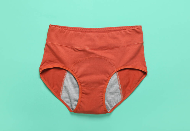 Reusable period panties on color background - Fotoğraf, Görsel