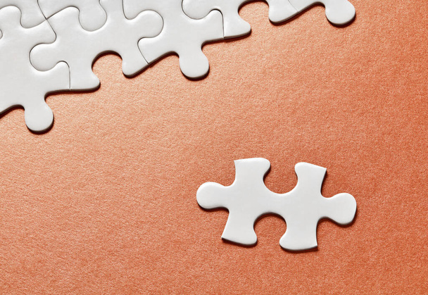 White puzzle pieces on colorful background - Photo, Image