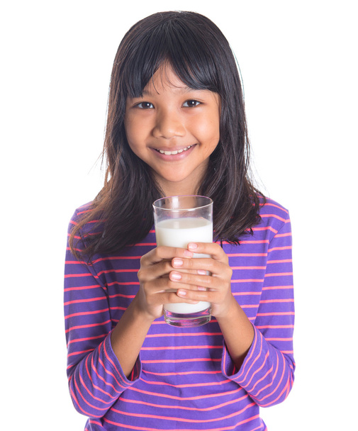 Young Asian Girl With Milk - Foto, afbeelding