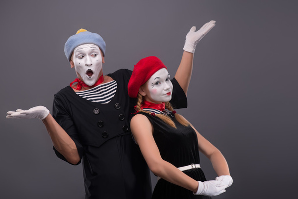 Portrait of funny mime couple with white faces and emotions isol - 写真・画像