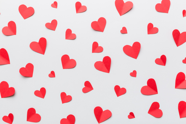 Valentine day background with red hearts, top view with copy space. - 写真・画像