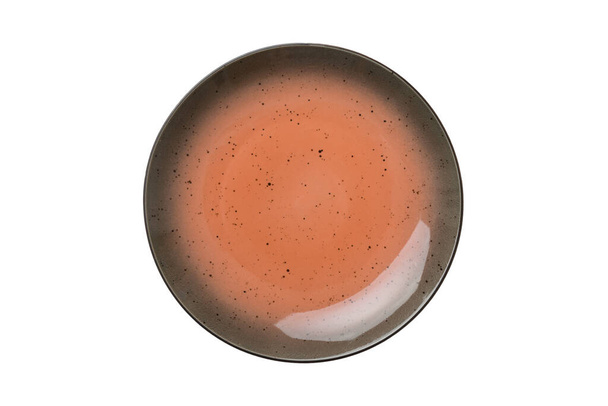 Narancs kerámia kerek lemez izolált fehér háttér. Felülnézet. - Fotó, kép