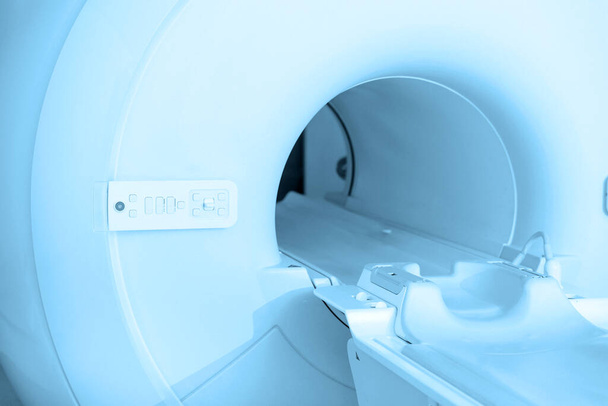 Medical CT or MRI Scan in the modern hospital laboratory. Interior of radiography department. Technologically advanced equipment in white room. Magnetic resonance diagnostics machine - Фото, зображення