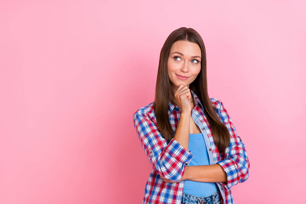Photo of thinking brunette young lady look promo wear blue red shirt isolated on pastel pink color background - Valokuva, kuva