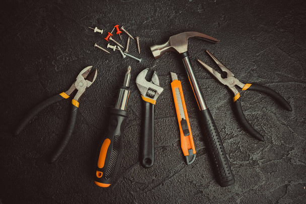 Basic Home Repair Tools On Black Background - Foto, immagini